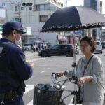 【大阪東住吉区】自転車に傘スタンドで「日傘」このサイズは合法？注意受けてたおばちゃんがおった